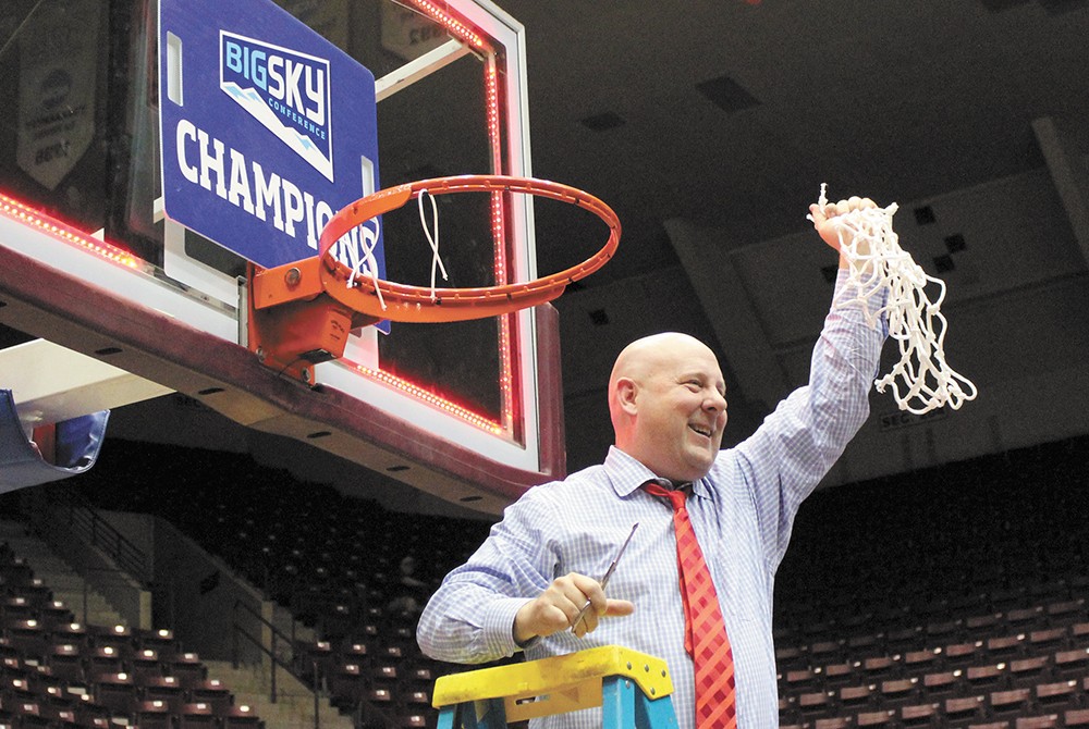 Coach Hayford cuts down the nets after a come-from-behind win against Montana gave the Eagles their first Big Sky Championship in more than a decade.