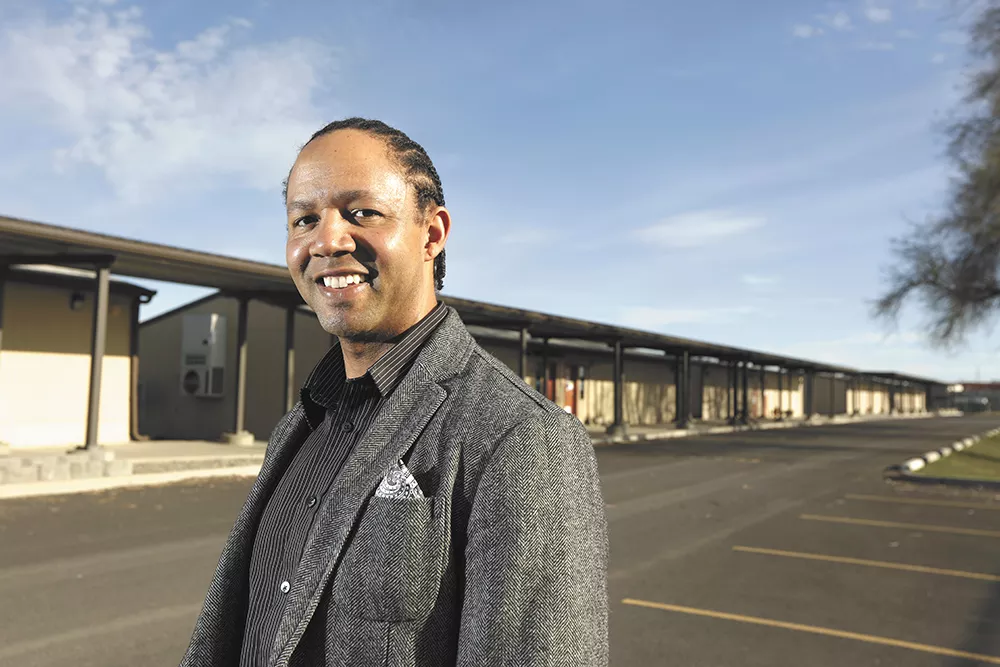 Andre Wicks, a former Shaw Middle School assistant principal, hopes to improve graduation rates in Hillyard by addressing multigenerational poverty. - YOUNG KWAK