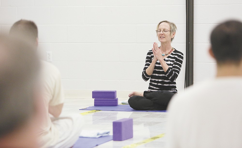 Diane Sherman says inmates find a "lovely opening into humanity" at her yoga classes. - YOUNG KWAK