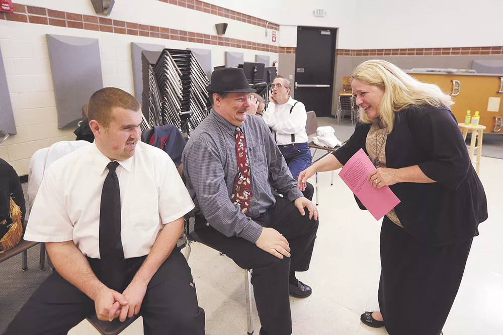 PACE Assistant Dean Linda DeFord (bottom right) wishes Brian and Adam (in hat) good luck. - YOUNG KWAK
