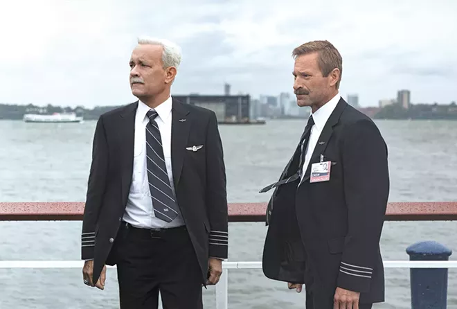 Tom Hanks (left) plays famed airline captain Chesley "Sully" Sullenberger. Aaron Eckhart (right) plays his co-pilot.