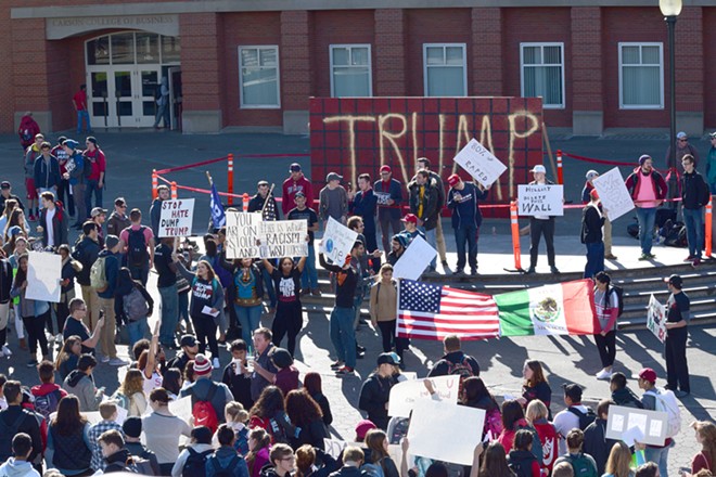 'Trump Wall' at WSU is met by scores of protesters