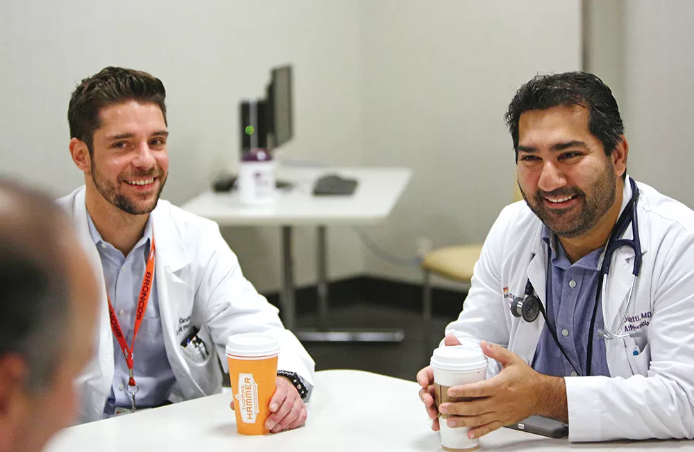 Resident physicians Joshua Gruhl (left) and Dinesh Ratti, an attending physician, have joined Dr. Potyk's Daily Dose of the Humanities sessions. - YOUNG KWAK