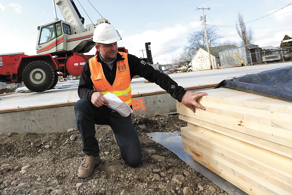 Beacon Builders' Mike Bradley says of cross-laminated timber: "I'm always interested in anything that's innovative or sustainable or both, and this is both." - YOUNG KWAK