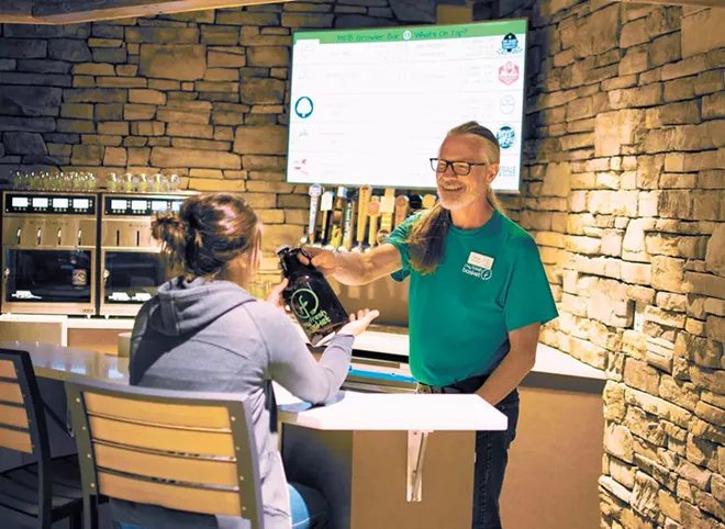 My Fresh Basket’s growler station offers local beer, cider, kombucha and craft soda. - STUART DANFORD