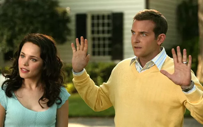 A couple inspired by the movie Wedding Crashers (pictured) got caught robbing a reception in Spokane Valley.