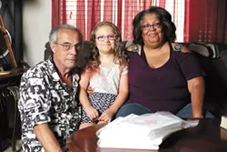 Ted and Leslie Gwiazda and their daughter, Lala, are featured in our new cover story about online education. - YOUNG KWAK