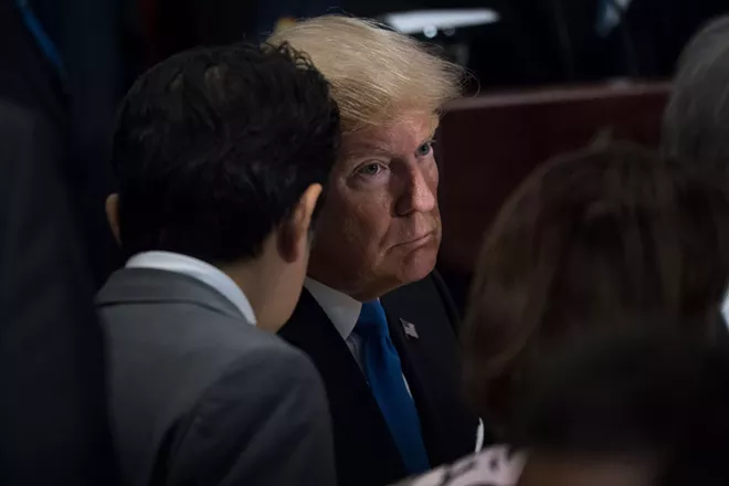 On Friday night, Trump said: “Wouldn’t you love to see one of these NFL owners, when somebody disrespects our flag, to say, ‘Get that son of a bitch off the field right now, out, he’s fired,'” the president said at the rally for Strange. - DOUG MILLS/THE NEW YORK TIMES