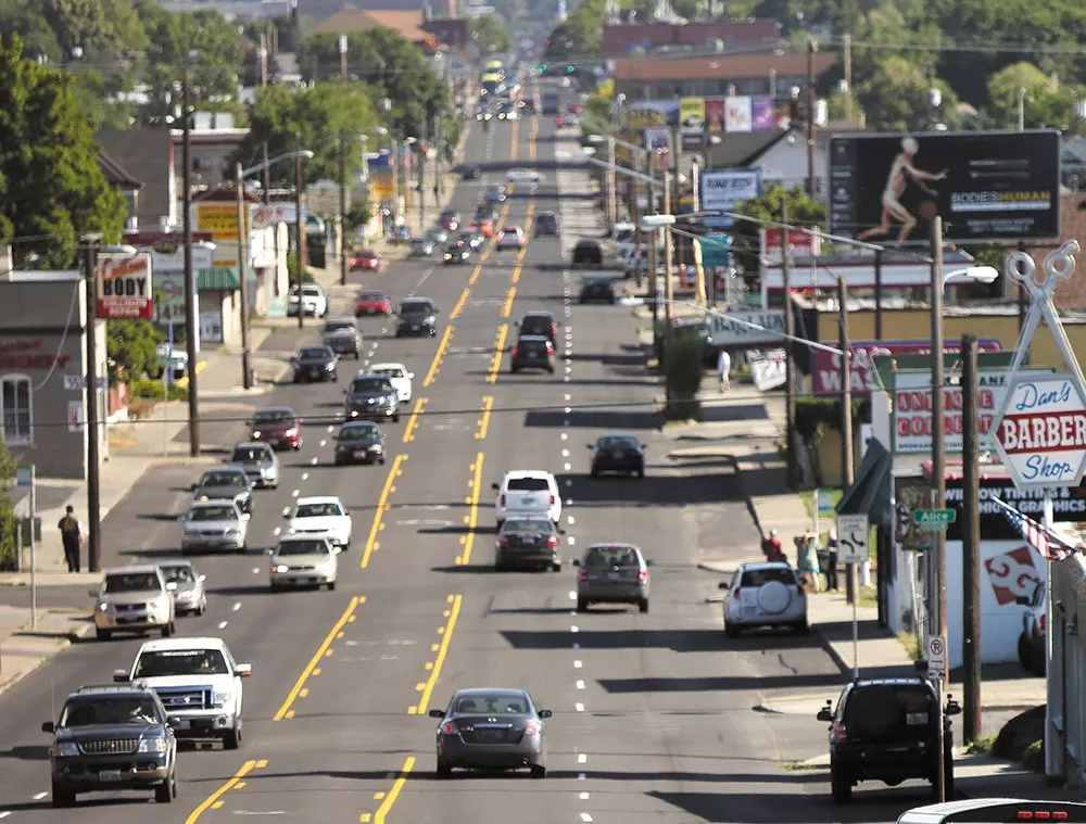 The Monroe Street city project has inspired a lawsuit from some of the road's business owners. - YOUNG KWAK
