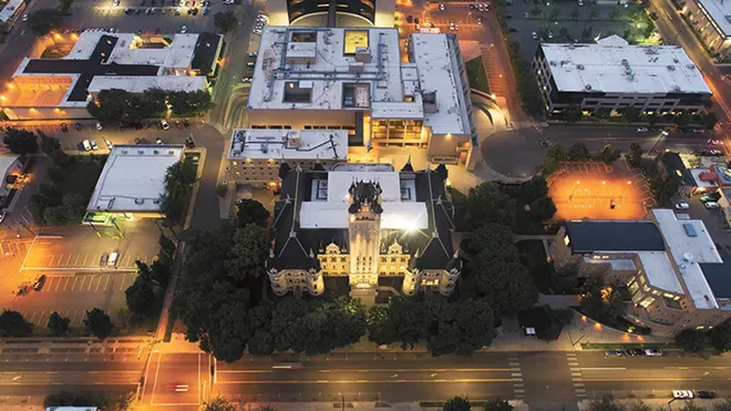 The Spokane County Courthouse and surrounding buildings light up the night sky. - BRYCE J. LEMING PHOTO
