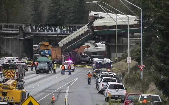 An Amtrak train derailed onto Interstate 5 in Dupont, Wash., on Dec. 18, 2017. Multiple people were killed and more than 75 were taken to local hospitals after an Amtrak train derailed from a highway overpass on Monday morning, according to local authorities. - RUTH FREMSON/THE NEW YORK TIMES