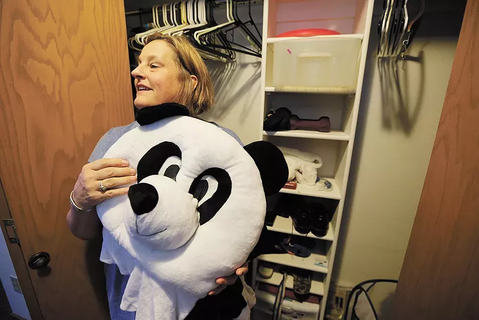 Ami Strahan with Sam's panda onesie, something he joked about wanting to wear to school, with the head, to see if anyone could recognize him. - YOUNG KWAK