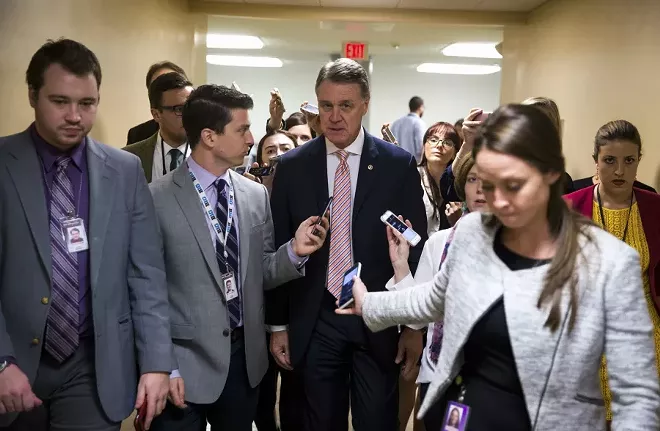 Sen. David Perdue (R-Ga.) arrives for a vote on Capitol Hill in Washington, Oct. 24, 2017. On Sunday, Perdue disputed the claim by Sen. Dick Durbin (D-Ill.) that President Donald Trump used the phrase “shithole countries” in describing Haiti and African nations. - AL DRAGO/THE NEW YORK TIMES