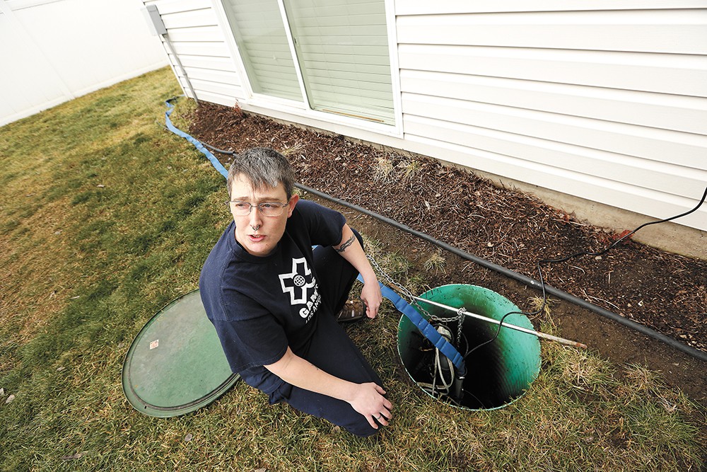 Terry Horne's sump pump wasn't enough to keep water out of her basement two times last year. - YOUNG KWAK