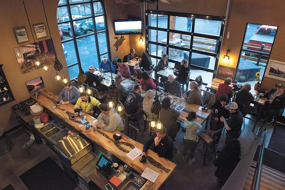 The taproom of the newly-opened Millwood Brewing was part of a $1 million dollar renovation project. - DEREK HARRISON
