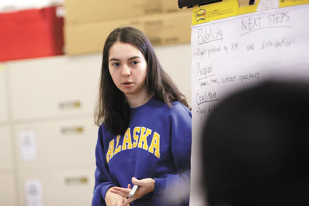 Ellary Lockwood, a junior at Lewis and Clark, leads a protest-planning meeting last weekend. - YOUNG KWAK