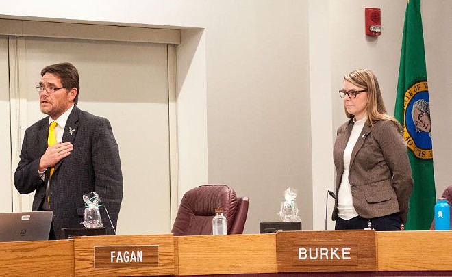 Council members Mike Fagan (left) and Kate Burke during the Pledge of Allegiance. - DANIEL WALTERS PHOTO