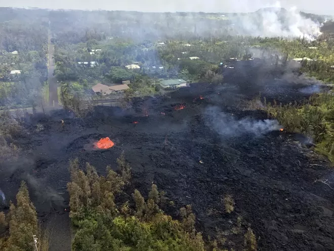 A photo provided by the U.S. Geological Survey shows a volcanic fissure, called fissure seven, in Leilani Estates, near Pahoa, Hawaii, May 5, 2018. More than two dozen homes have been destroyed since the Kilauea volcano began erupting last week, officials said on Sunday, as at least 10 fissures emerged, spewing lava into residential neighborhoods on the eastern edge of the island of Hawaii. - U.S. GEOLOGICAL SURVEY VIA THE NEW YORK TIMES