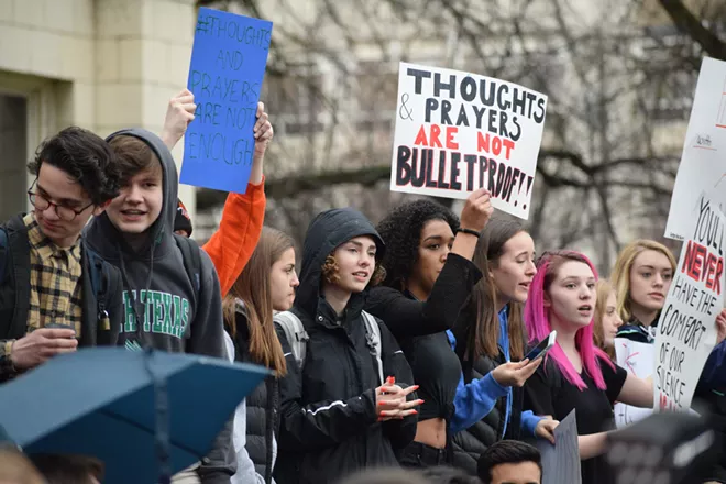 Lewis and Clark High School students during a school walkout in protest of gun violence earlier this year. - WILSON CRISCIONE PHOTO