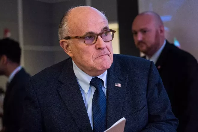 Rudy Giuliani walks offstage after speaking at an event in Washington, May 5, 2018. The special counsel plans to finish by Sept. 1 the investigation into whether President Trump obstructed the Russia inquiry, according to Giuliani, who said on May 20 that waiting any longer would risk improperly influencing voters in the midterm elections in November. - ERIN SCHAFF/THE NEW YORK TIMES