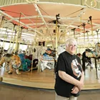 Bette Largent keeps the Looff Carrousel looking as sharp as it did more than 100 years ago