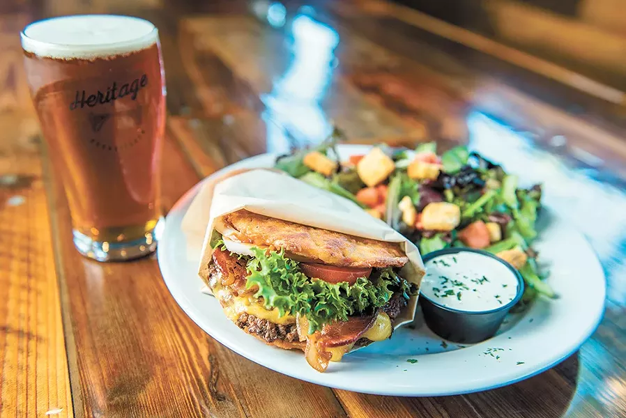 Crispy hash browns replace the bun on this burger. - ERICK DOXEY PHOTO