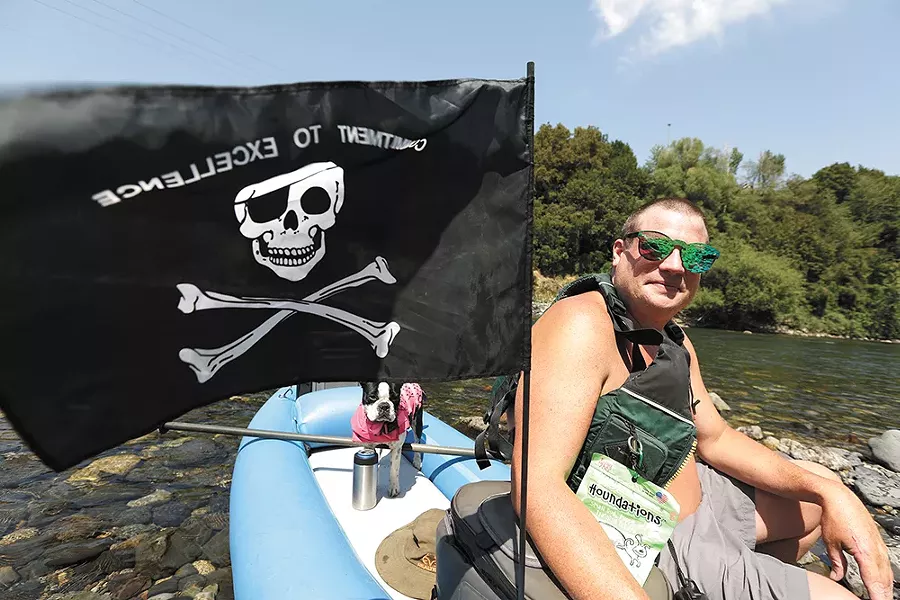 Shain McPherson floats the river nearly everyday to escape his "dry land" problems. - YOUNG KWAK