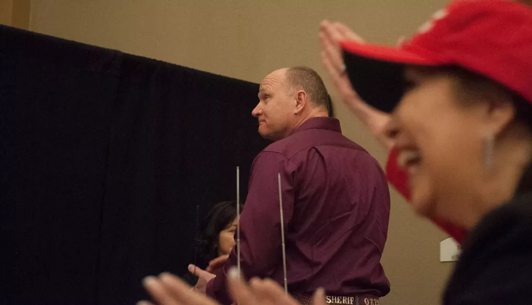 Ozzie Knezovich gets ready to speak at a 2017 pro-Trump rally. He was introduced by Cecily Wright. - DANIEL WALTERS PHOTO