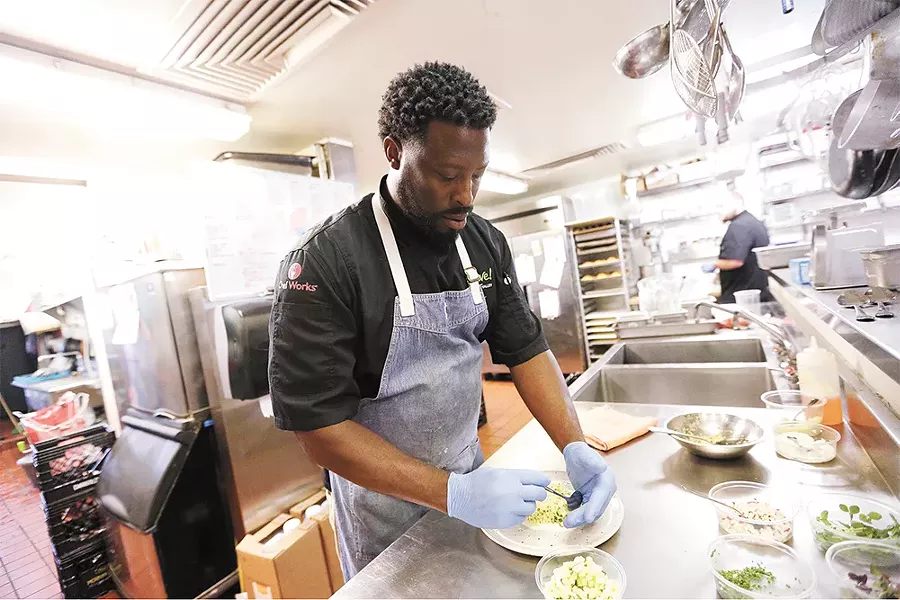 Careful preparation is key for Spokane chef Joseph Morris. - YOUNG KWAK