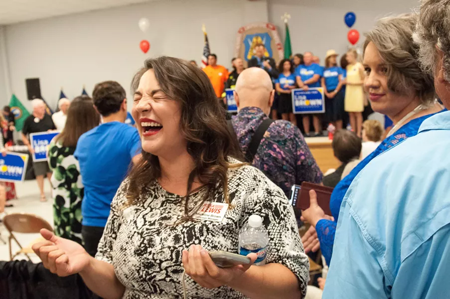 Madeline Brown, Jessa Lewis's campaign manager, laughs in glee about the initial results. - DANIEL WALTERS PHOTO