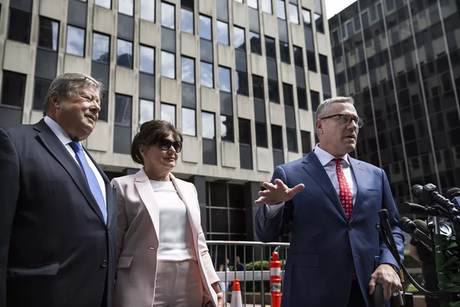 Amalija and Viktor Knavs, parents of first lady Melania Trump, watch as their attorney Michael Wildes, right, comments after the couple naturalized as U.S. citizens at the Jacob K. Javits Federal Building in Manhattan, Aug. 9, 2018. - HOLLY PICKETT/THE NEW YORK TIMES