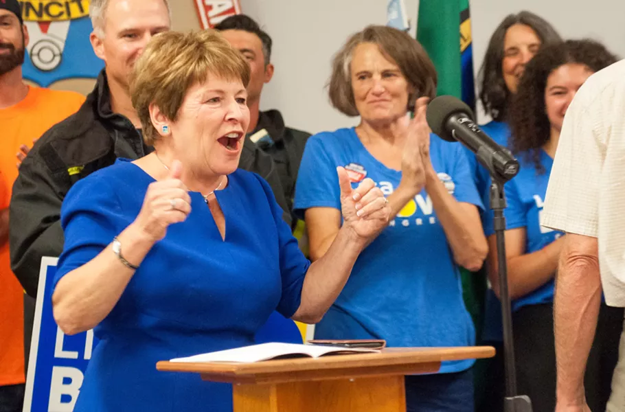 Lisa Brown takes the podium on election night. - DANIEL WALTERS PHOTO