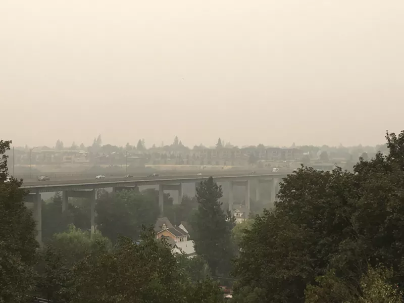 Smoky skies seen over the Maple Street Bridge Sunday afternoon. - SAMANTHA WOHLFEIL PHOTO