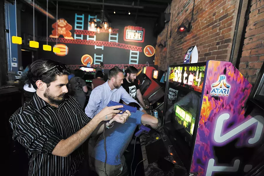 Scott Mailhean takes aim at Gamers Arcade Bar. - YOUNG KWAK