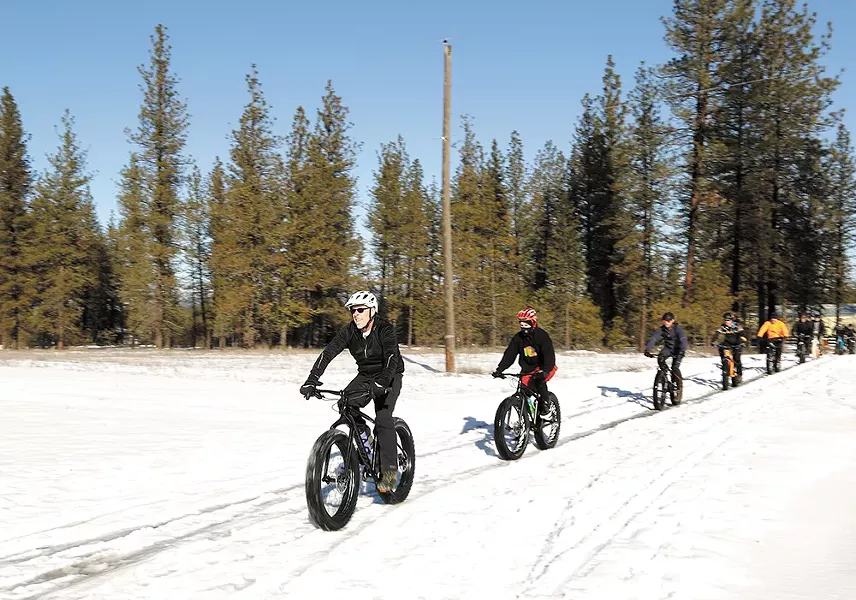 Fat-tire bike riders head out on a trail at the 7 mile area of Riverside State Park. - YOUNG KWAK