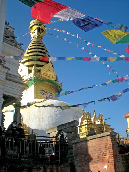 Prayer flags hanging in Nepal - RAEVYN WEST PHOTO
