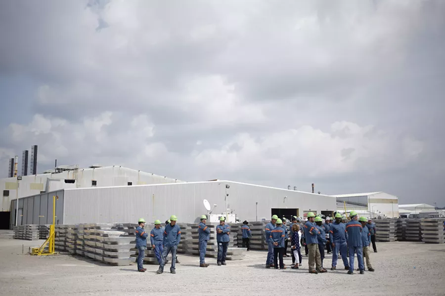 Workers at Century Aluminum in Hawesville, Ky., Aug. 22, 2018. Lingering tariffs on foreign steel and aluminum, combined with retaliatory taxes that foreign governments have placed on American products, are undercutting what concessions the Trump administration won in the new trade agreement with Canada and Mexico. - LUKE SHARRETT/THE NEW YORK TIMES