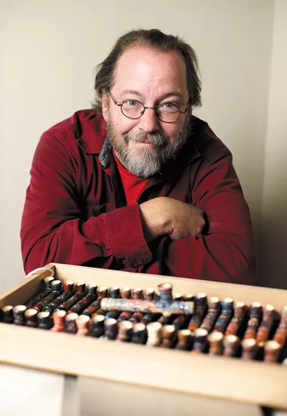Bill Hunton shows off his clay pipes. - YOUNG KWAK