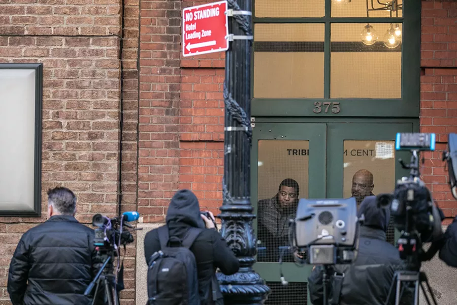 Reporters gathered outside the Tribeca Film Center building, where a suspicious package addressed to actor Robert De Niro was discovered to have contained a pipe bomb and removed by a police bomb squad, in New York, Oct. 25, 2018. Two additional pipe bombs, one addressed to former Vice President Joe Biden and the other, De Niro, were found in Delaware and New York, law enforcement officials said Thursday. - JEENAH MOON/THE NEW YORK TIMES