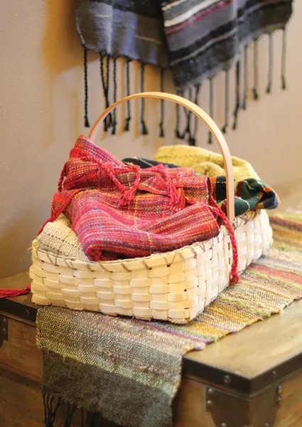 Sue Tye custom-dyes the fibers she weaves into tablerunners, throws and pillow covers - CARRIE SCOZZARO PHOTOS