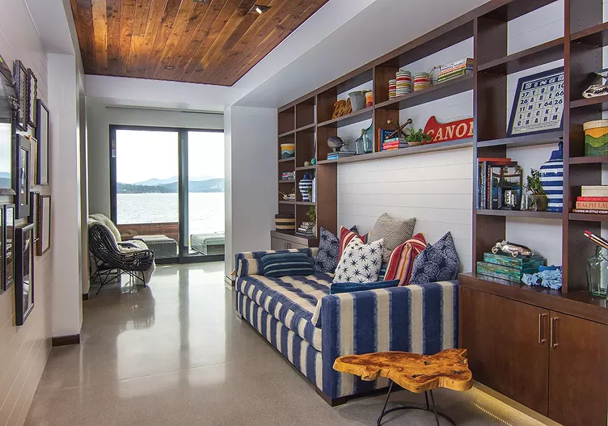 A colorful reading library fills the hall space leading to the suite. - JOEL RINER PHOTO