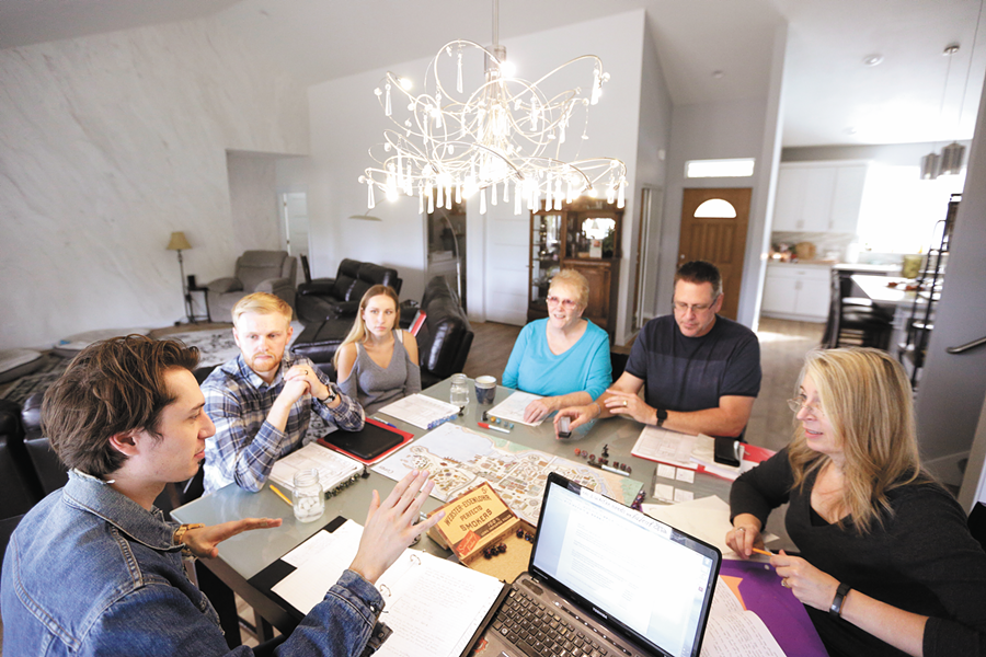 The Adrian family plays Dungeons & Dragons in their Spokane Valley home. - YOUNG KWAK