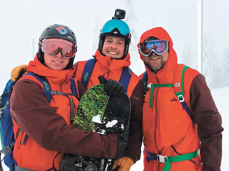The author, right, and fellow ski guides.