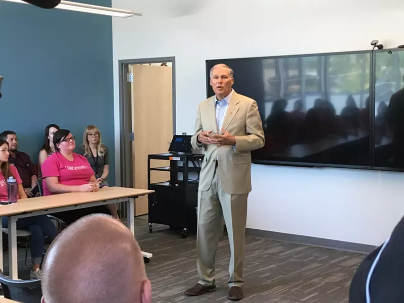 Gov. Jay Inslee speaks at the Spokane Planned Parenthood location in 2018 as he said the state would fight the Trump administration's attempts to change Title X rules. - SAMANTHA WOHLFEIL PHOTO
