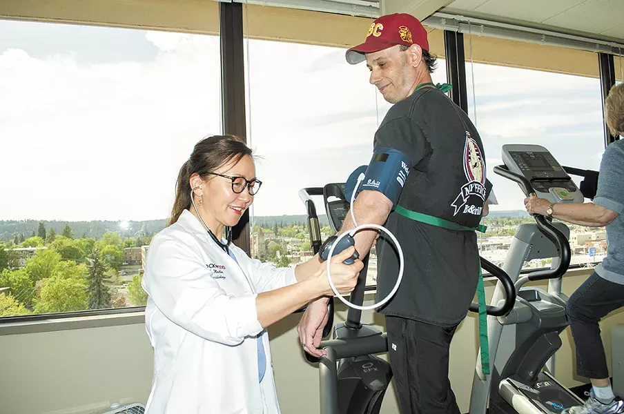 Vince Cohen gets his blood pressure monitored by Dr. Ellie Mueller at the Rockwood Clinic Heart and Vascular Center. - SARAH WURTZ