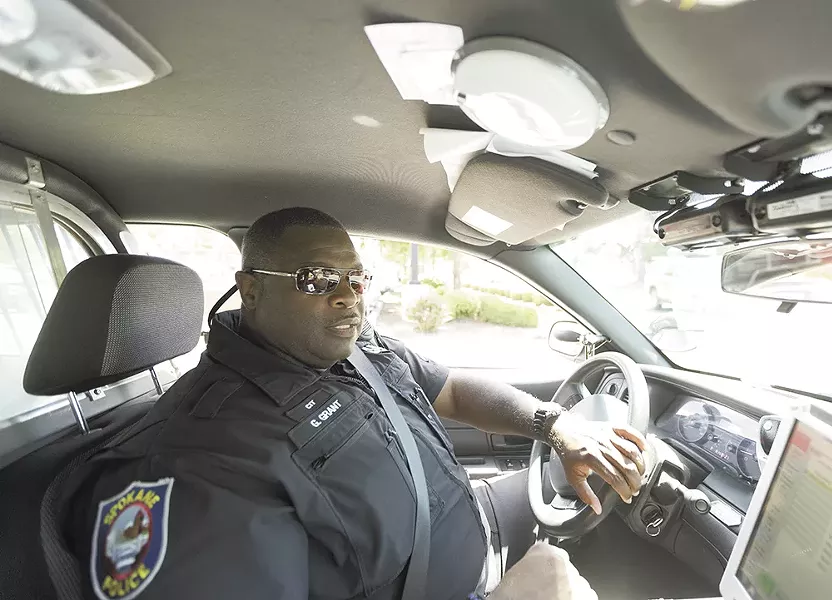 Spokane Police Officer Gordon Grant takes a humanist approach to policing. "I'm not a dick, but you're not going to run me over either." - YOUNG KWAK