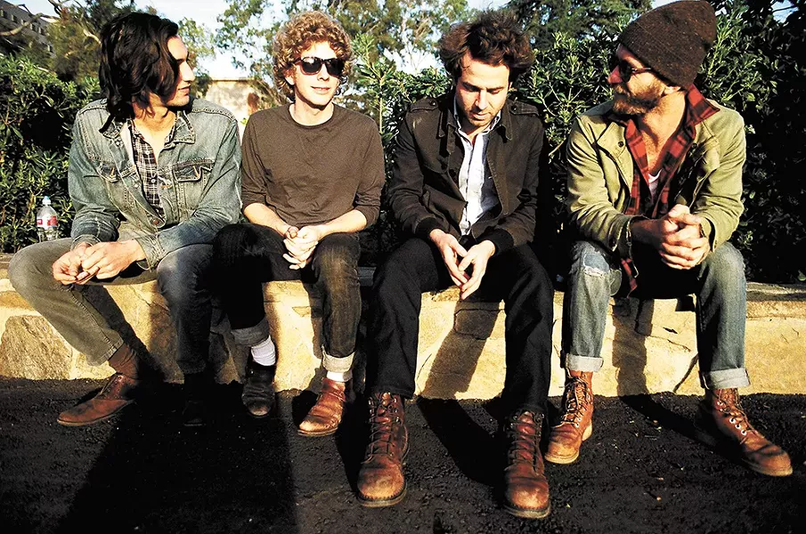 Dawes' bass player Wylie Gelber, far left, says his band's tour bus smells like socks.