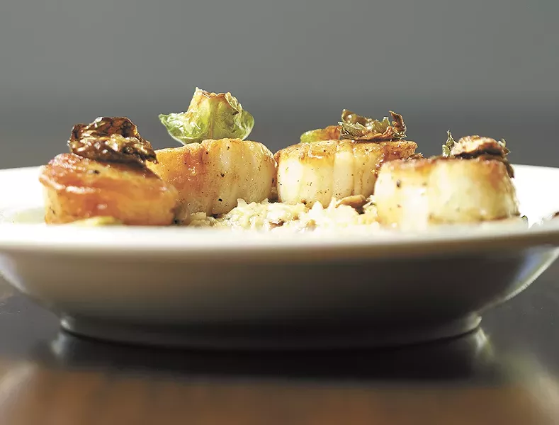 An order of scallops on the "fresh sheet" menu from Downriver Grill. - YOUNG KWAK