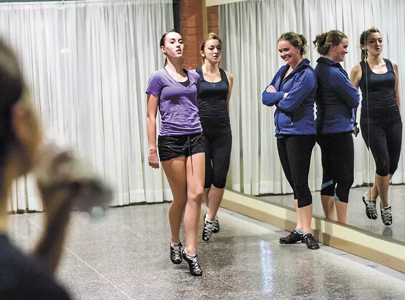Irish dance teacher Caitlin Truslter, in blue, instructs her championship dancers at her South Perry District studio. - JEFF FERGUSON