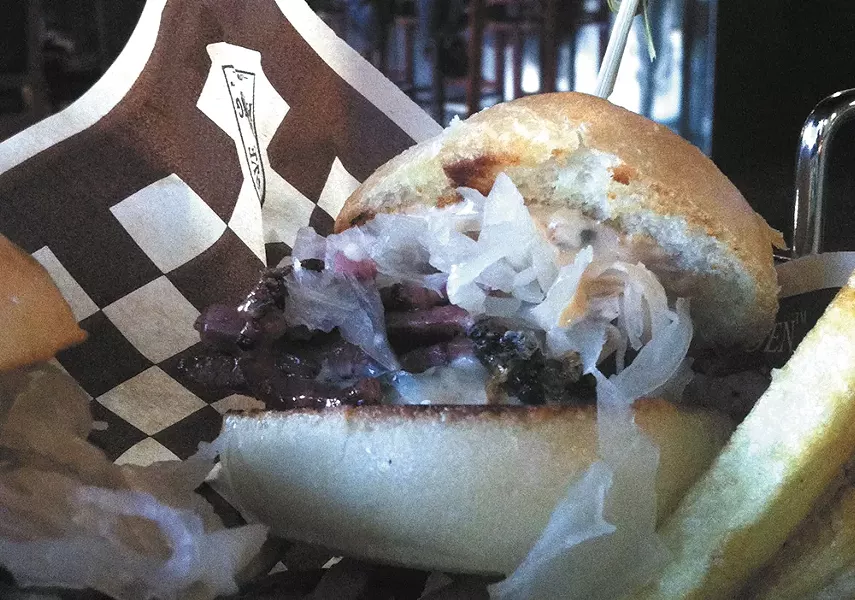 A pastrami sandwich from Rivelle's. - CARRIE SCOZZARO